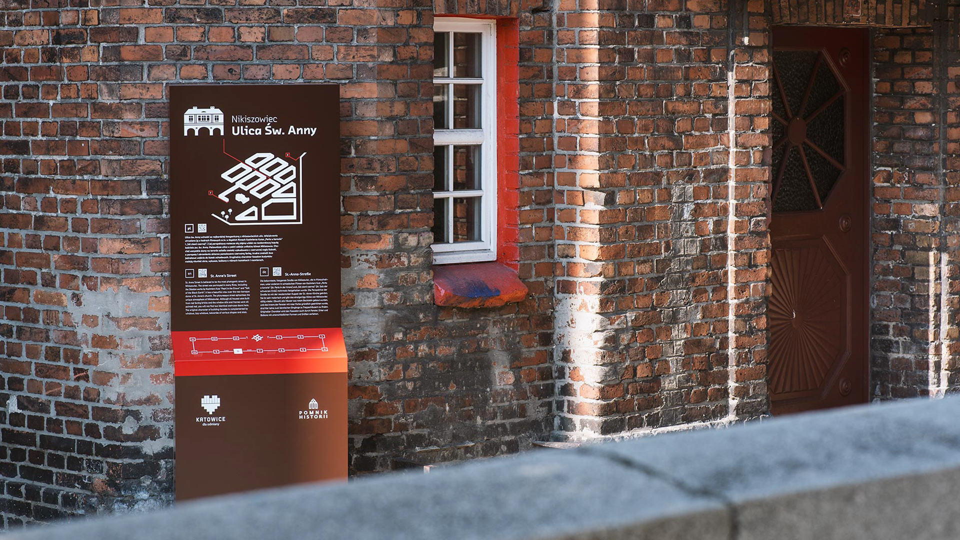 Wayfinding system for a walking route in Nikiszowiec in Katowice