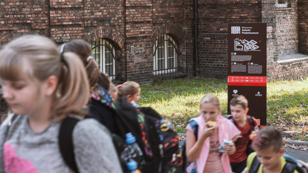 Wayfinding system for a walking route in Nikiszowiec in Katowice