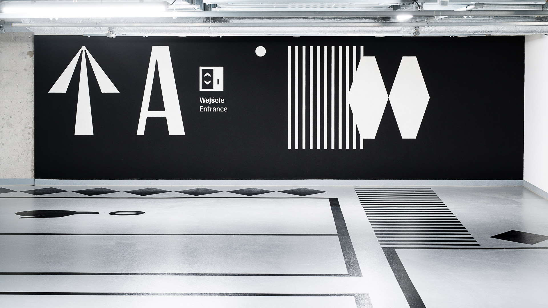 Environmental graphics and space branding in the parking of the office building