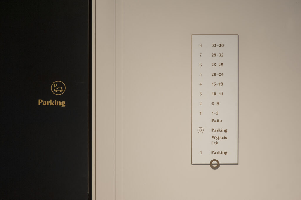 System informacji wizualnej wewnątrz budynku Doki Living 3
