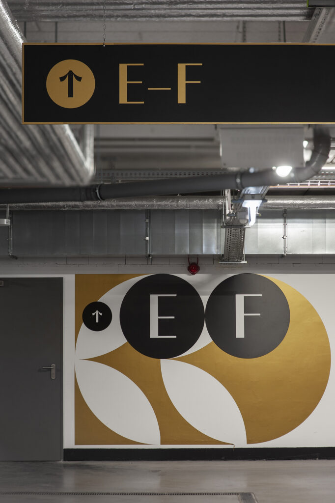 Wayfinding system in the garage in residential building DOKI Living