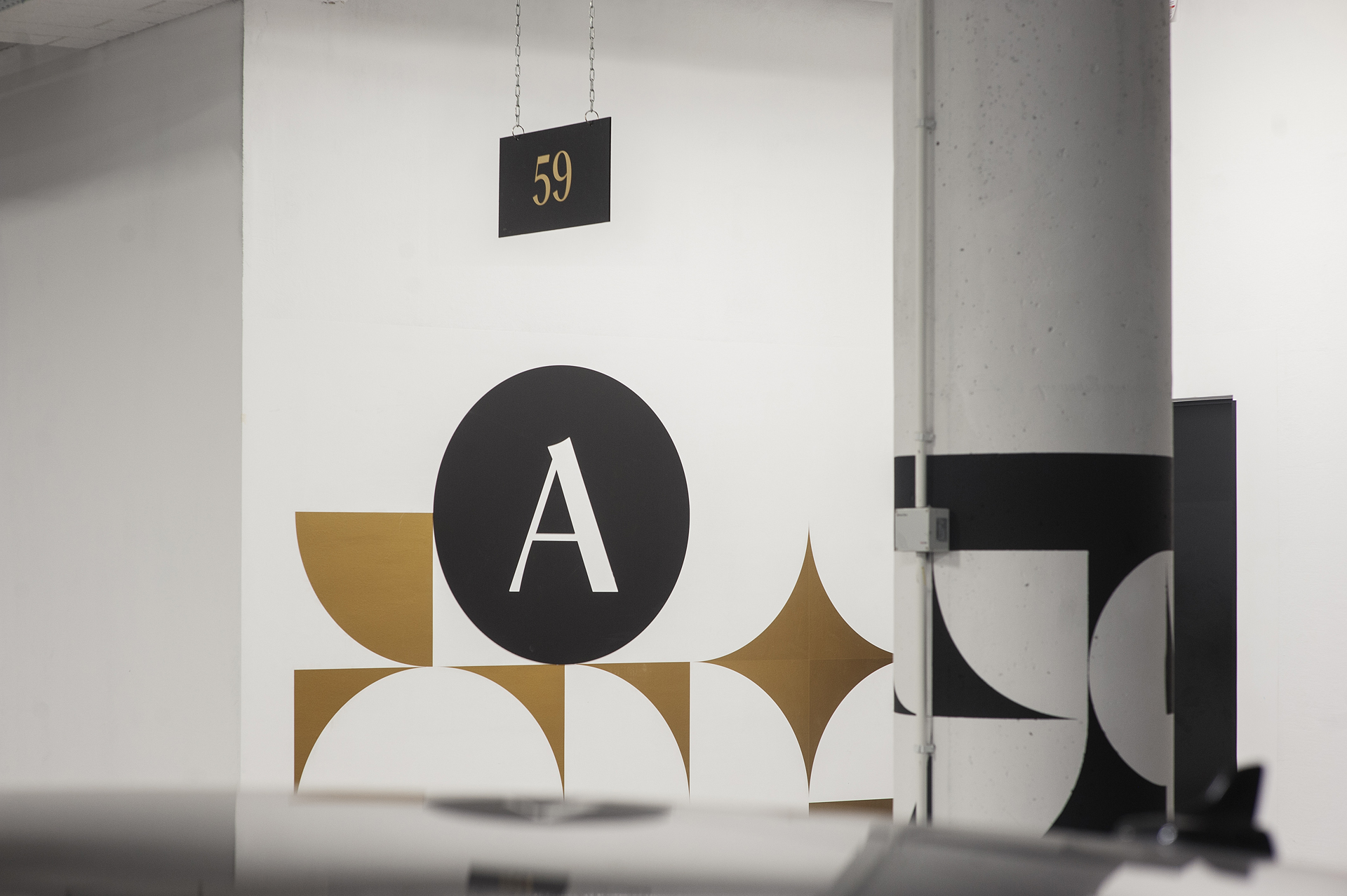 Environmental graphics in the parking in residential building DOKI Living