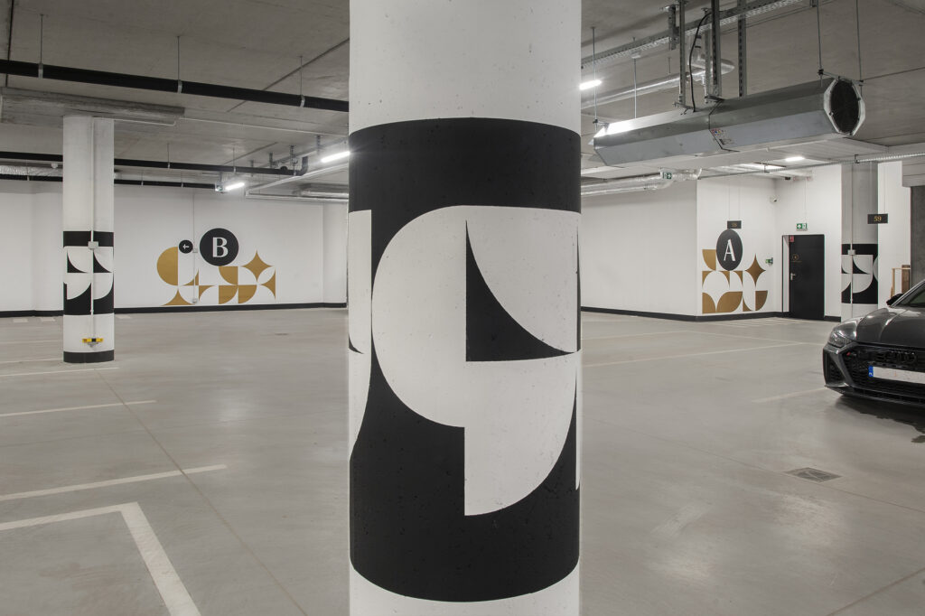 Environmental graphics in the parking in residential building DOKI Living