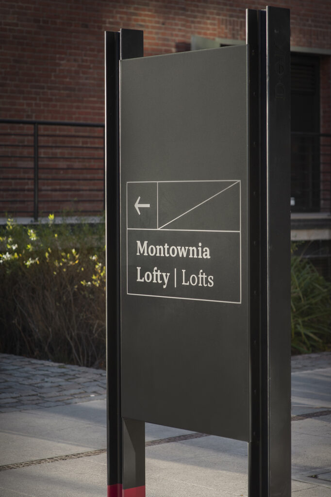 Directional signage in post-shipyard place DOKI in Gdansk