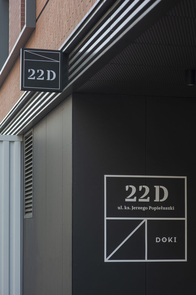 Entrance signage to the apartment building