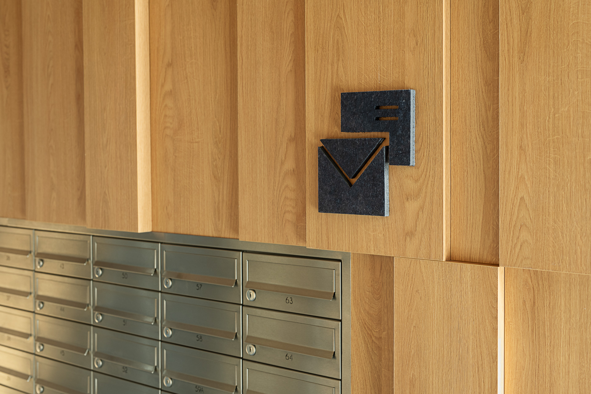 ATAL SKY+ Katowice residential wayfinding felt icon