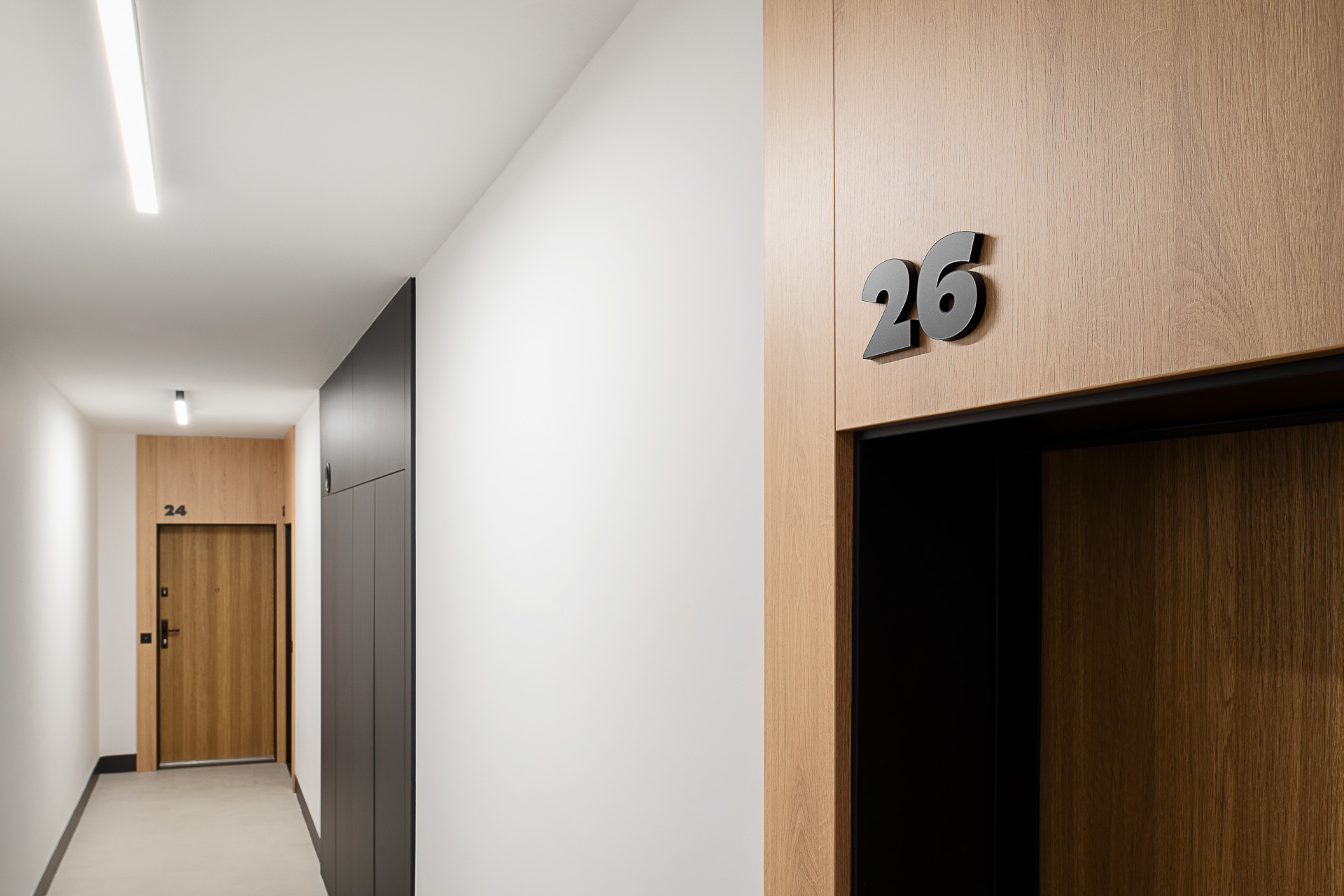 ATAL SKY+ Katowice residential wayfinding corridor signage