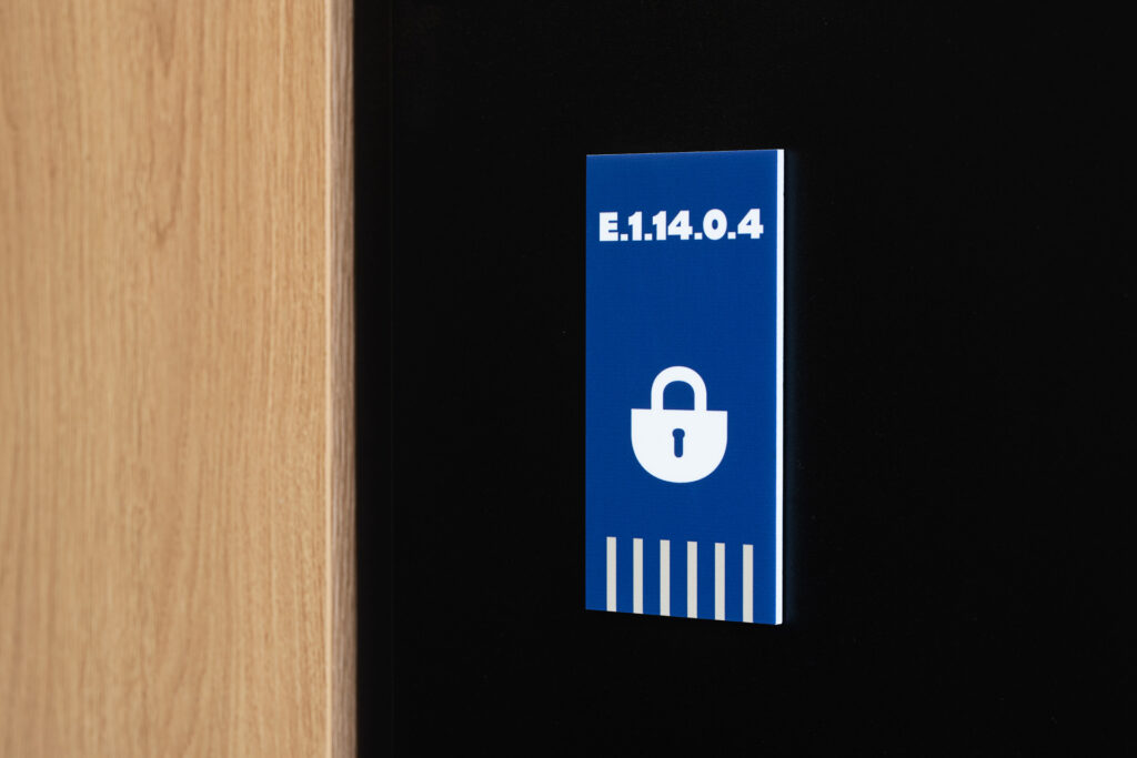 ATAL SKY+ Katowice residential wayfinding acrylic carrier