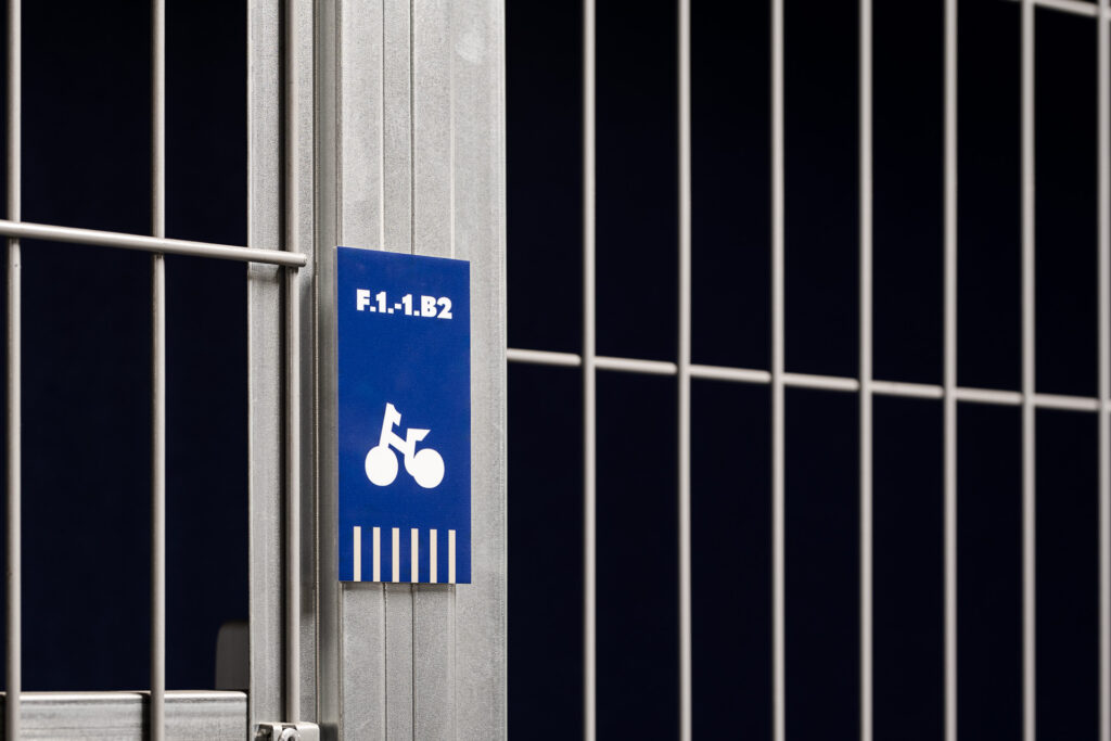 ATAL SKY+ Katowice residential wayfinding acrylic carrier