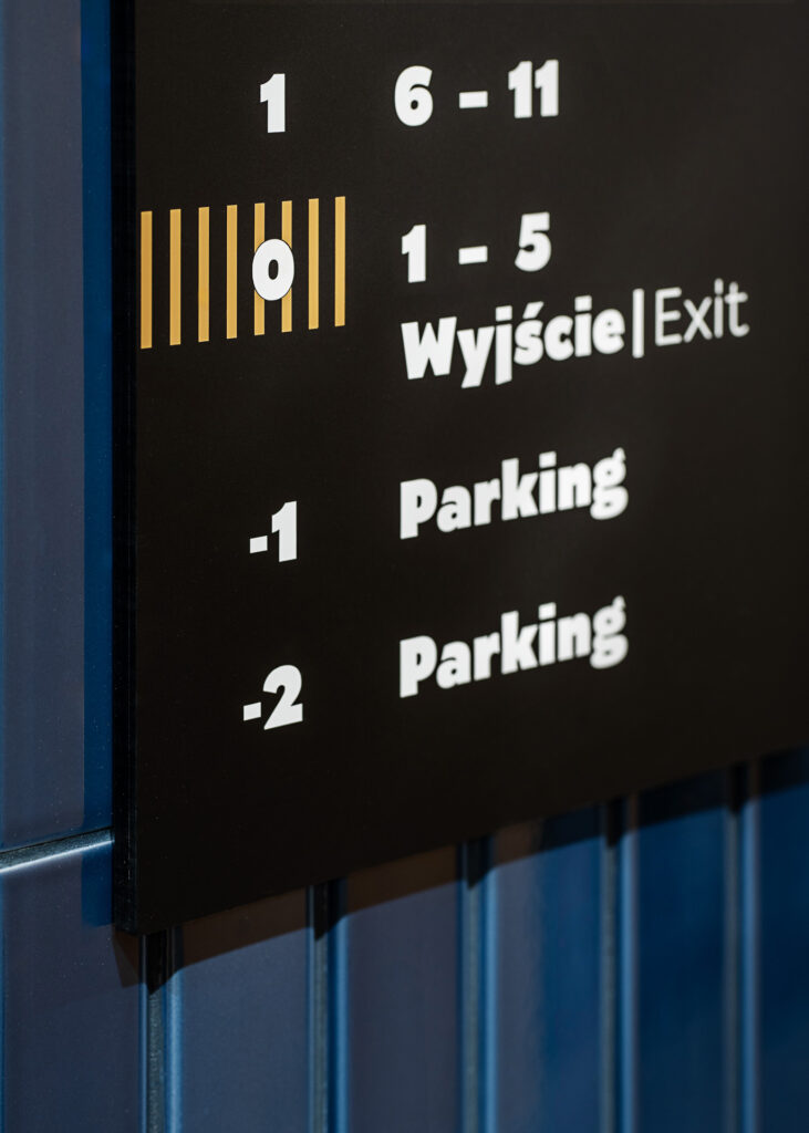 ATAL SKY+ Katowice residential wayfinding elevator signage