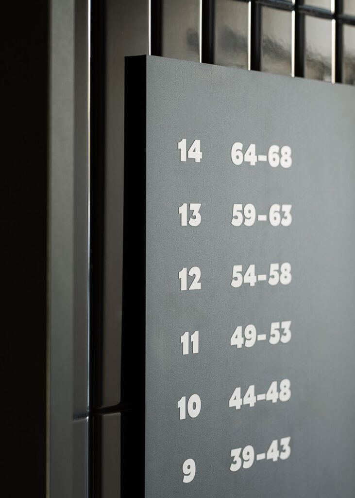 ATAL SKY+ Katowice residential wayfinding elevator signage