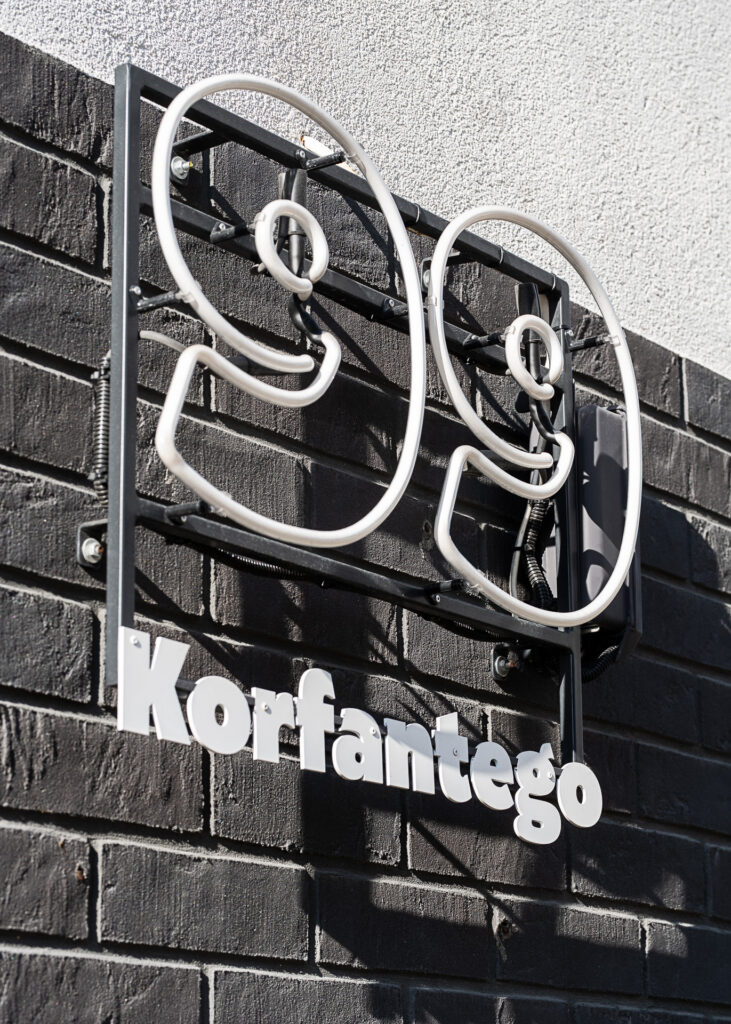 ATAL SKY+ Katowice residential wayfinding neon signage