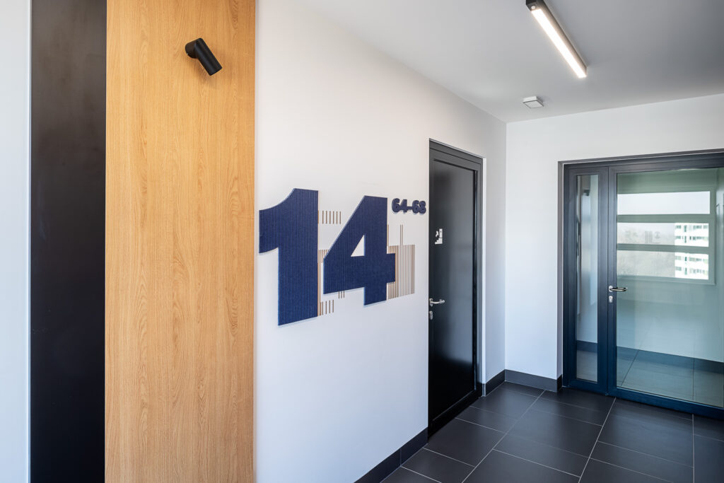 ATAL SKY+ Katowice residential wayfinding felt floor number
