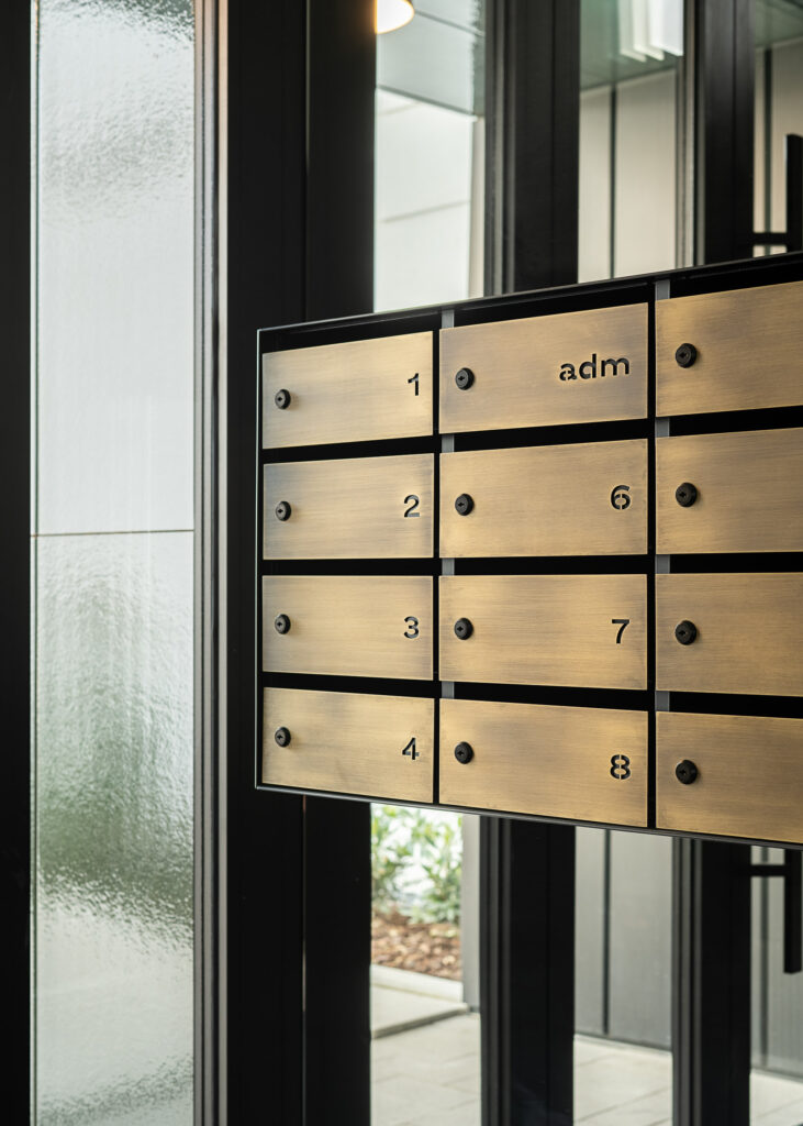 Wayfinding system Młyny Mogilska Noho Investment mail signage