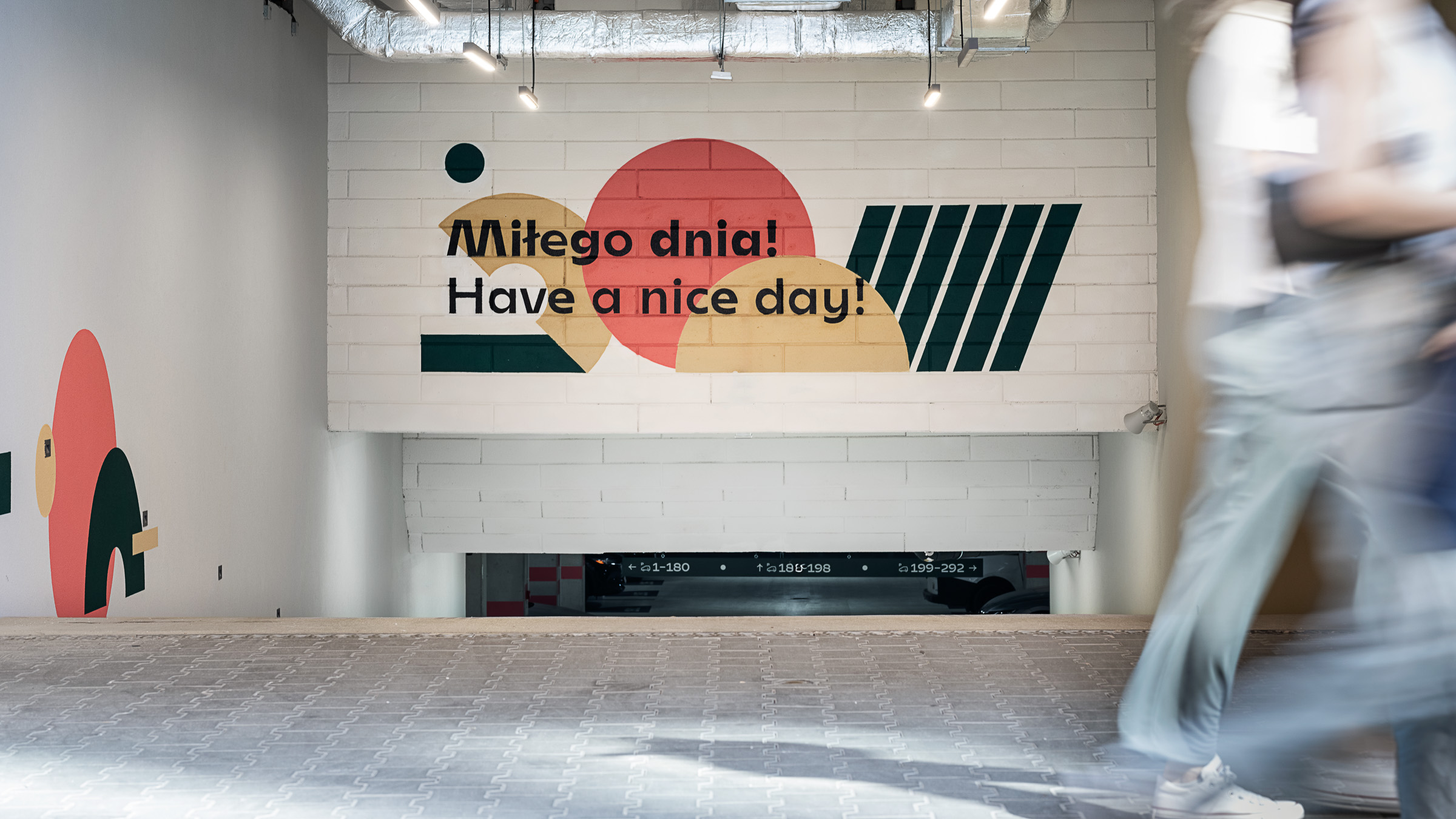 Wayfinding system residential building environmental graphics in the parking