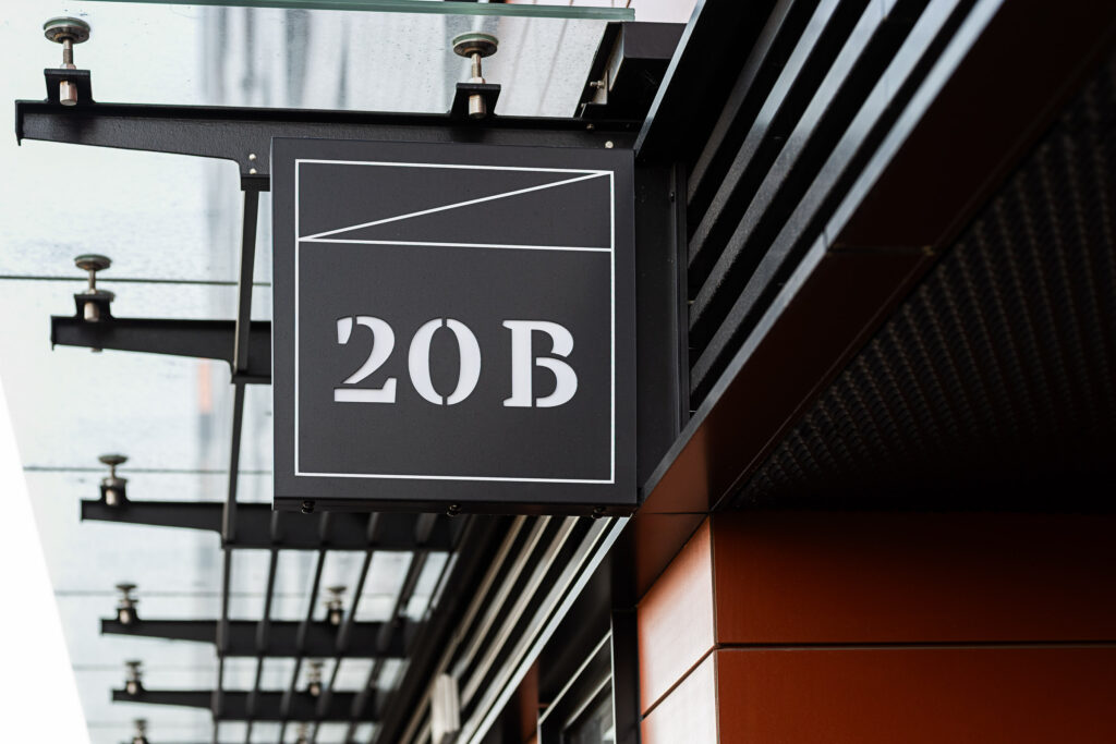 Doki Living Gdansk residential building semaphore with address