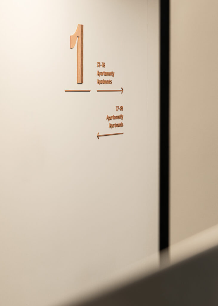 Słoneczne Tarasy Lodz signage on the corridor