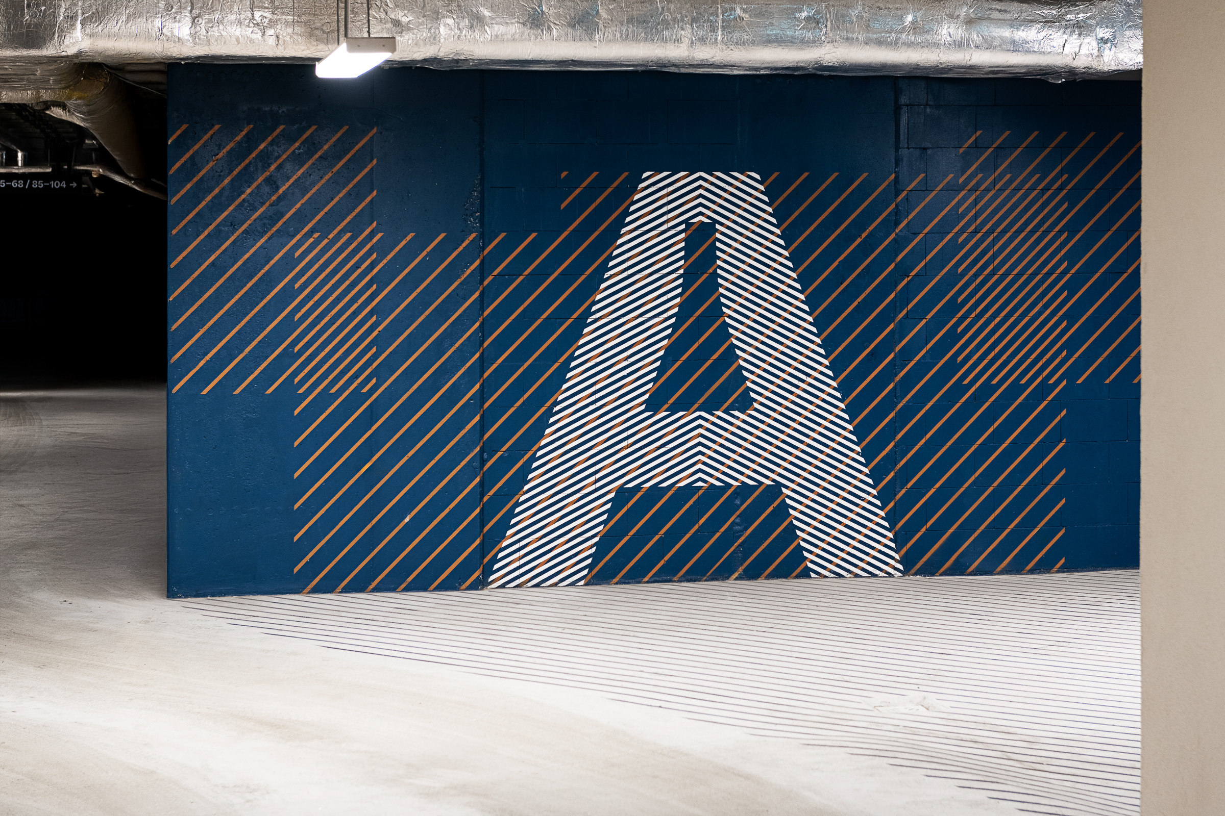 Słoneczne Tarasy w Łodzi wayfinding w parkingu