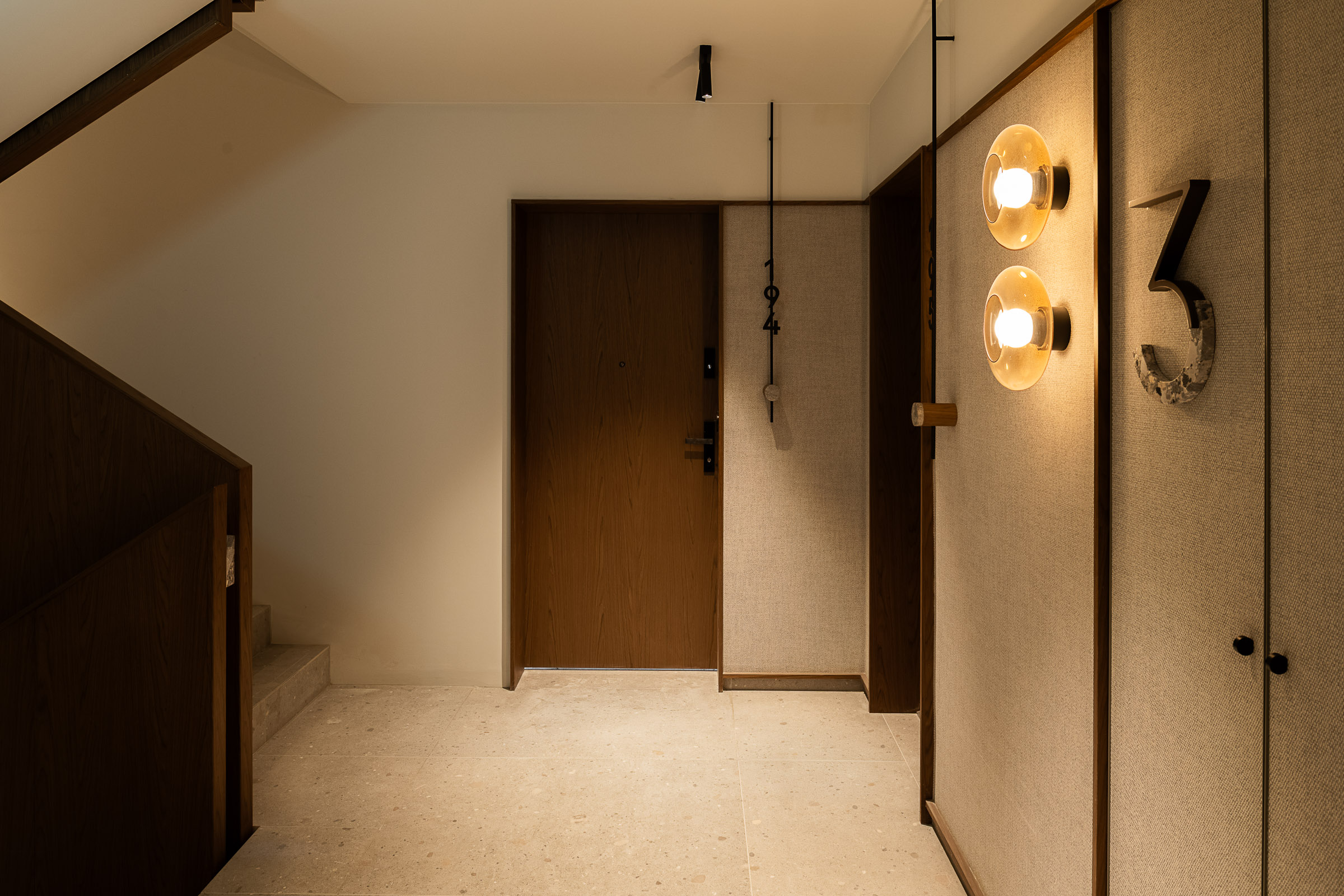Wayfinding system in a residential building in Krakow, designed for NOHO Investment.